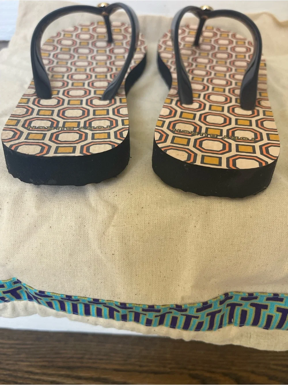 Tory Burch Navy Strap Flip Flops with Yellow & Orange Geo Print